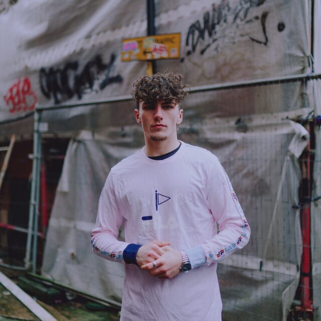 Baby Pink FILA Spell Out Tapered Long Sleeved T-Shirt
