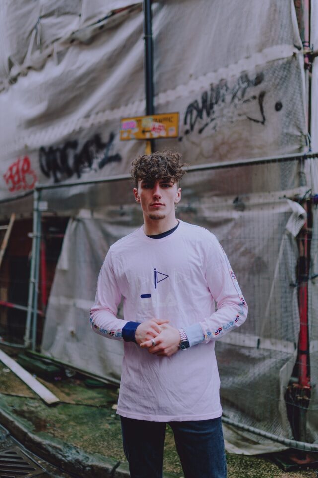 Baby Pink FILA Spell Out Tapered Long Sleeved T-Shirt