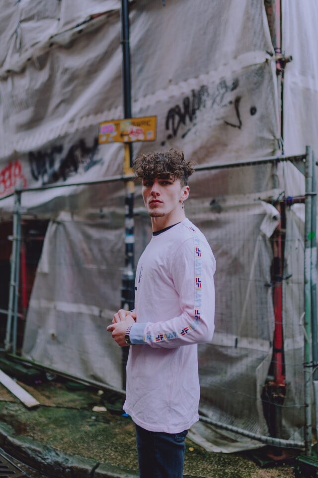 Baby Pink FILA Spell Out Tapered Long Sleeved T-Shirt