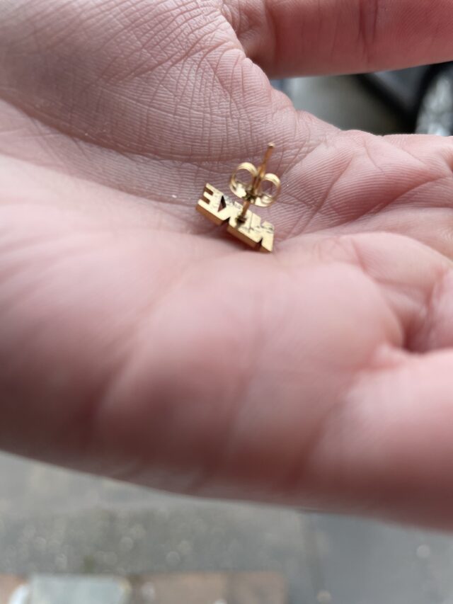 Gold Plated Nike Spell Out Stud Earrings