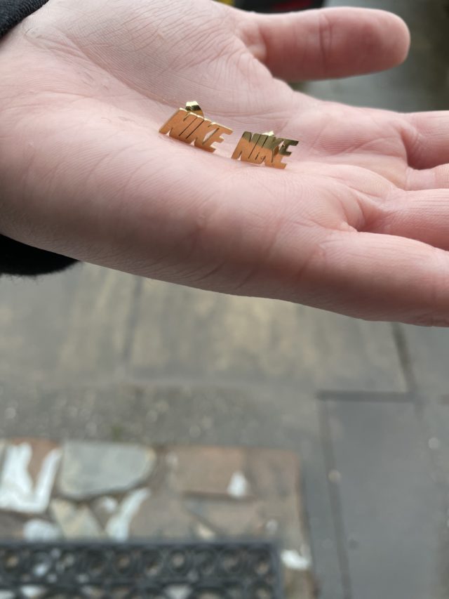 Gold Plated Nike Spell Out Stud Earrings