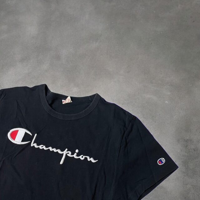 Men's Vintage Black Champion Embroidered Spell Out Tshirt - L